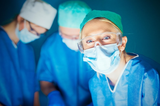 Doctors working in surgery room