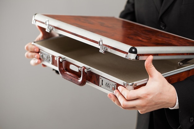 Document case in businessman hands