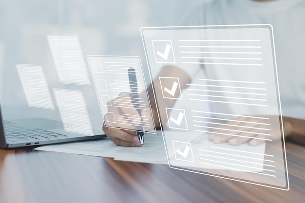 document checklist concept businessman using computer for dms documents management and erp software for document system management automation software to archiving and efficiently manage information