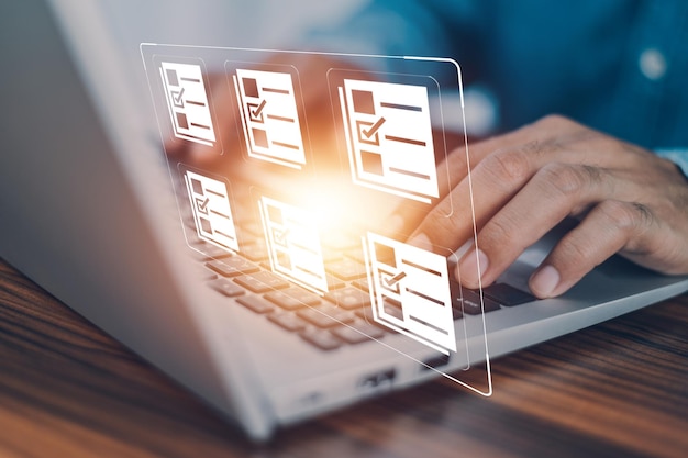 Document management concept Businessman using computer to document management concept online documentation database and digital file storage system or software records keeping database technology