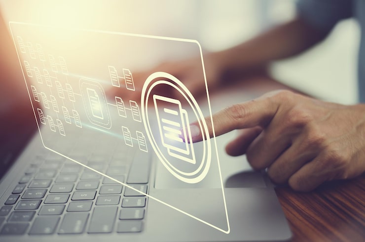 Photo document management concept businessman using computer to document management concept online documentation database and digital file storage system or software records keeping database technology