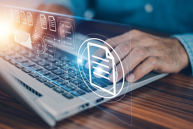 Document management concept Businessman using computer to document management concept online documentation database and digital file storage system or software records keeping database technology