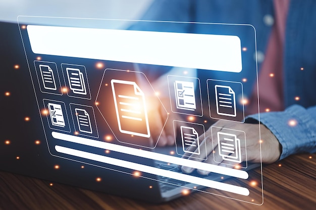 Document management concept Businessman using computer to document management concept online documentation database and digital file storage system or software records keeping database technology