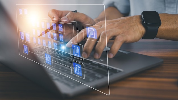 document management concept businessman using computer to document management concept online documentation database and digital file storage system or software records keeping database technology