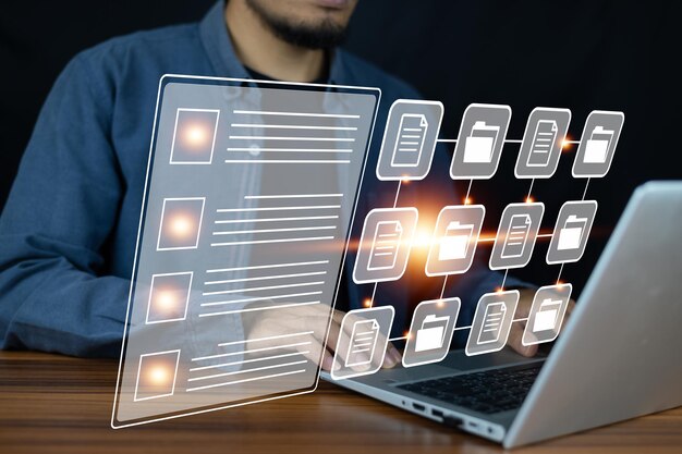 Document management concept Businessman using computer to document management concept online documentation database and digital file storage system or software records keeping database technology