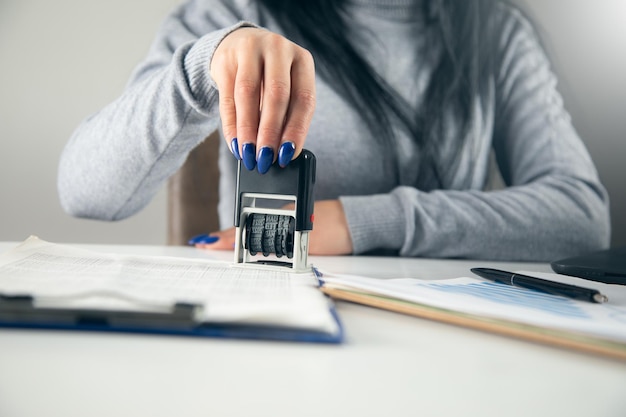 Photo document paper stamper in office