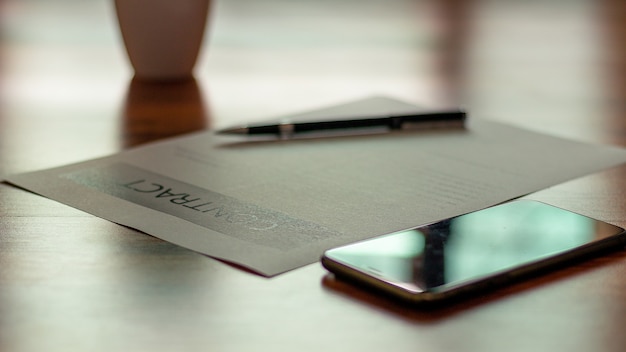 Photo documents for signing documents are placed on the business desk.