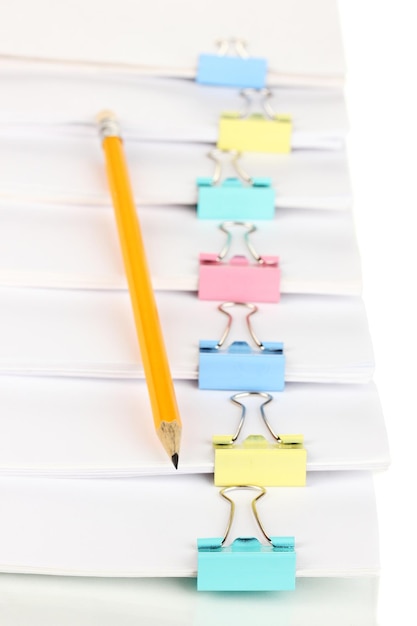 Documents with binder clips close up