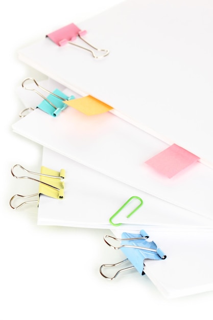 Photo documents with binder clips close up