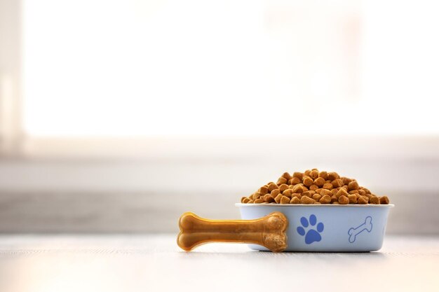 Dog food in bowl on table