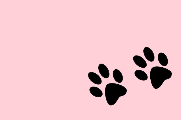 Photo dog footprints on a pink background with copy space