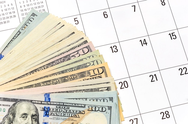 Dollar banknotes on the calendar