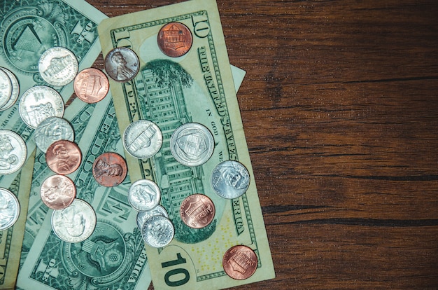 Dollar bill with coin  on top view