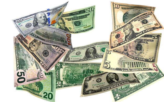 Dollarbiljetten van verschillende coupures vliegen geld