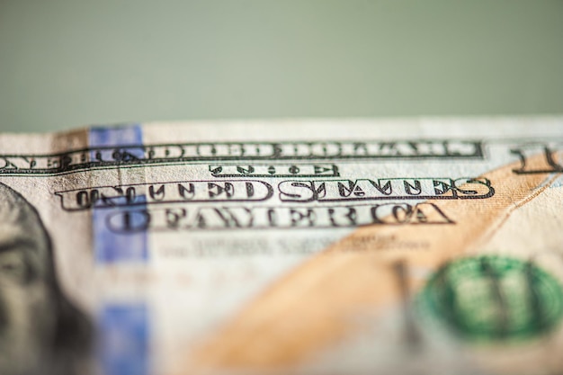 ドルの背景百米ドル紙幣は多くのアメリカの現金マネーの選択的な焦点を請求します