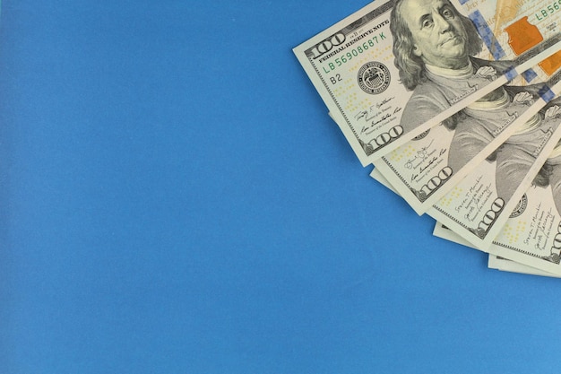 Dollars money on blue background place for text cope space