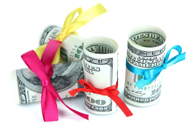 Dollars with gift bow isolated 