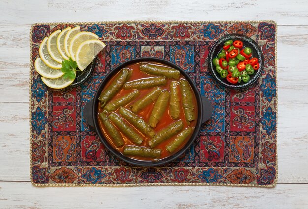 Photo dolma stuffed grape leaves. iranian cuisine.