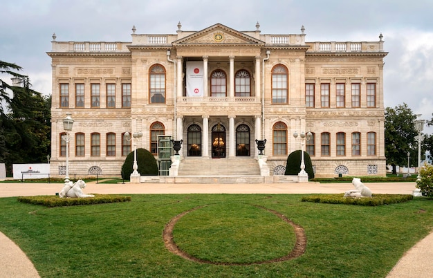 Dolmabahce Palace on the shore of the Bosphorus Strait on a cloudy day Istanbul Turkey