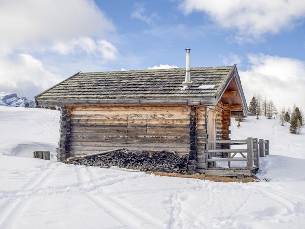 Dolomites snow panorama wooden hut val badia armentarola