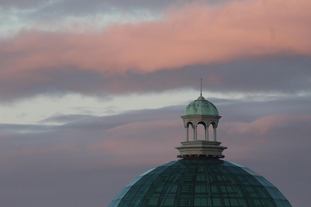 dome against cloudy sky during sunset