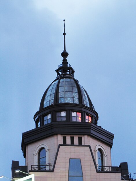 The dome of the building against the blue sky