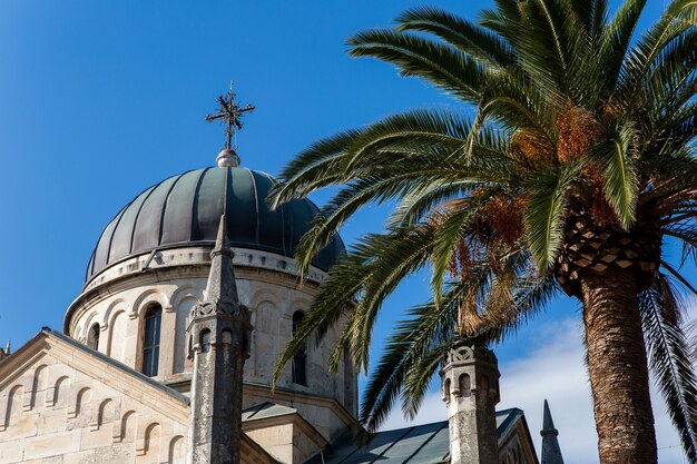 Dome of the great Church in the fall with palm trees