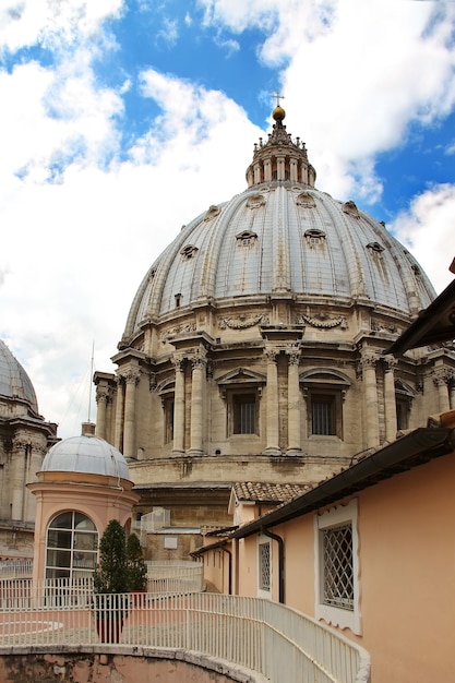 Dome of Saint Peter's Basilica on background clouds, Vatican City, Italy