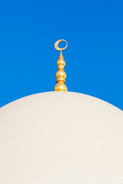 Dome of Sheikh Zayed Grand Mosque with blue sky, UAE