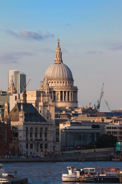 The Dome Of St Pauls Cathedral Across The Thames River By The Early Evening Sun London