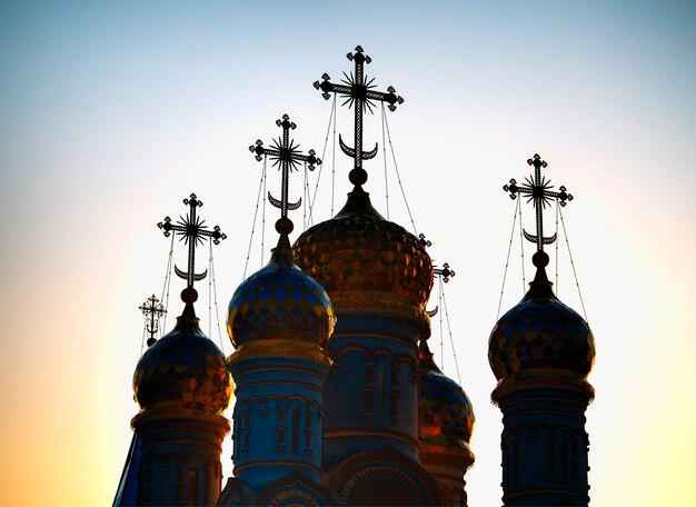 Domes of Dormition Cathedral at Ryazan during stunning sunset background