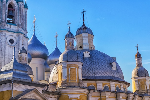 Domes of the Russian Orthodox Church against blue sky.