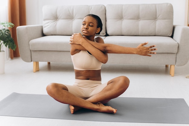 Domestic Workout Young Sporty Black Woman Doing Plank Exercise At Home Training In Living Room