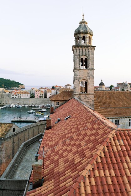 Dominican monastery bell tower and Adriatic Sea, Dubrovnik late in the evening, in Croatia