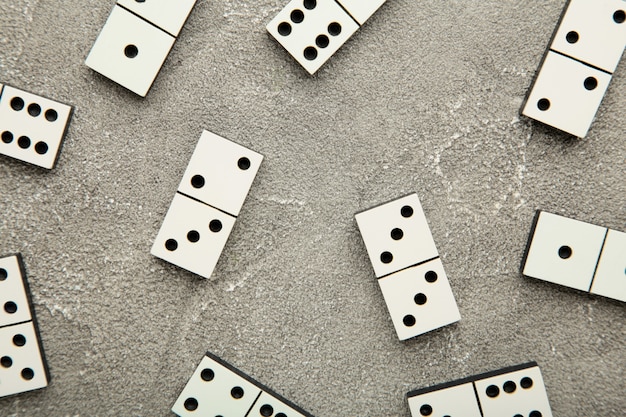 Domino pieces on the grey surface