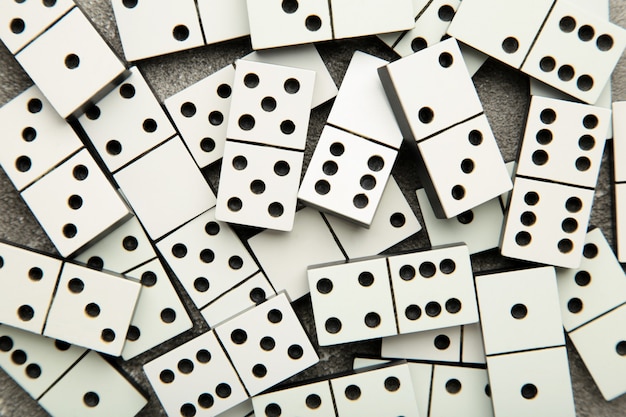 Domino pieces on the grey surface