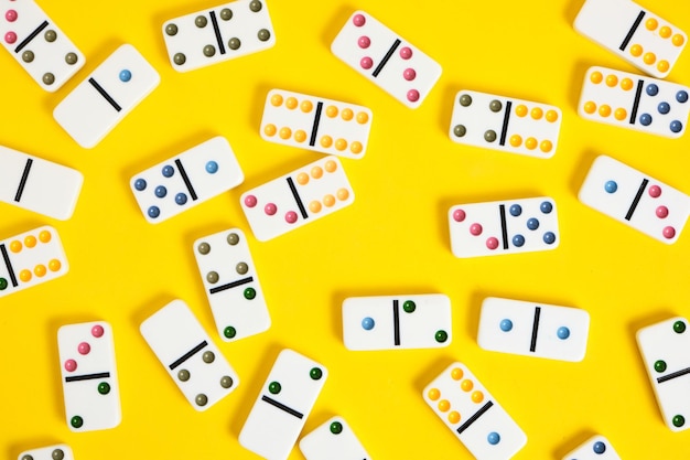 Dominoes on a yellow backgroundBoard game
