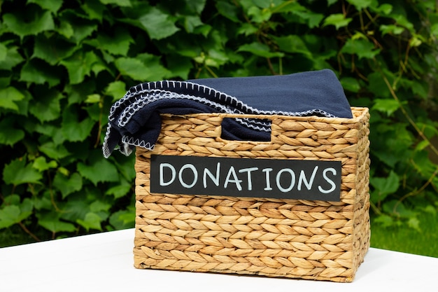 Donation box for clothing in the garden