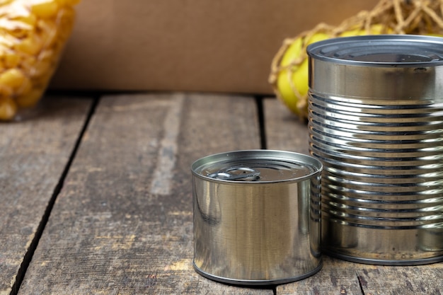 Donations food with canned food on the table background. Donate concept. Close up.