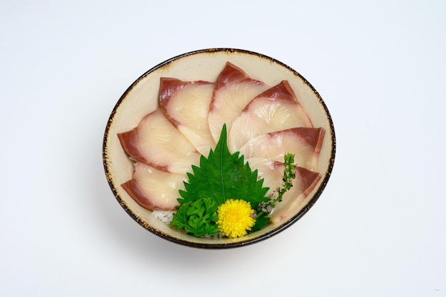 Donburi sliced raw hamachi set on japanese rice