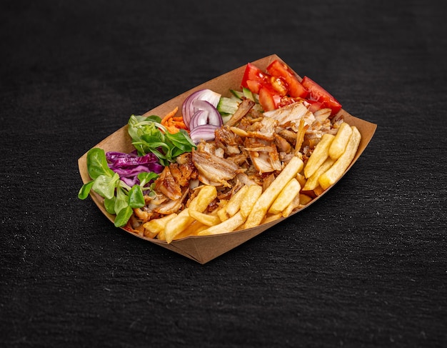 Doner kebab on a paper plate