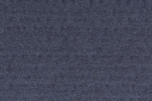 Donkerblauwe gestructureerde achtergrond Textuur van blauwe achtergrond met grijze vlekken en stippen