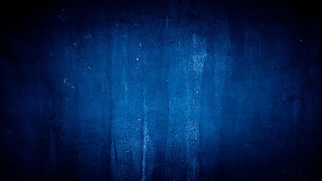 donkerblauwe grungy abstracte cement betonnen muur textuur achtergrond