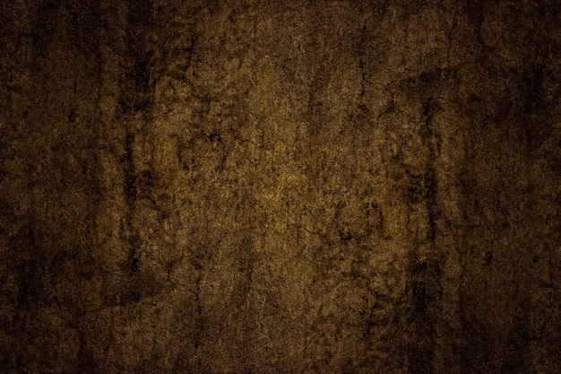 Donkerbruine kleur abstracte grunge getextureerde oude betonnen muur oppervlak voor background