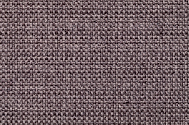 Donkere bruine textielclose-up als achtergrond. Structuur van de stoffenmacro