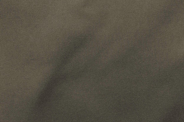 Donkergrijze kleur stof doek polyester textuur en textiel achtergrond