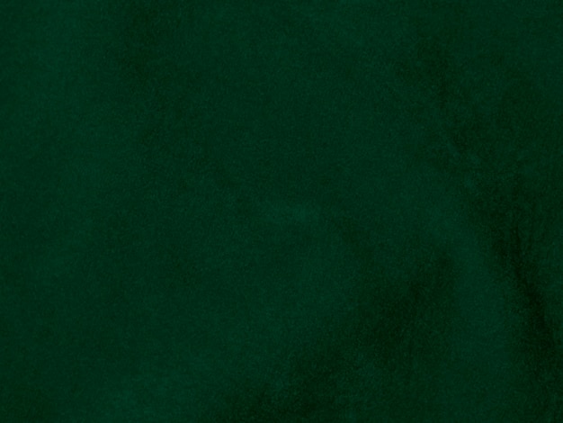 Donkergroene oude fluwelen stof textuur gebruikt als achtergrond Lege groene stof achtergrond van zacht en glad textiel materiaal Er is ruimte voor tekst