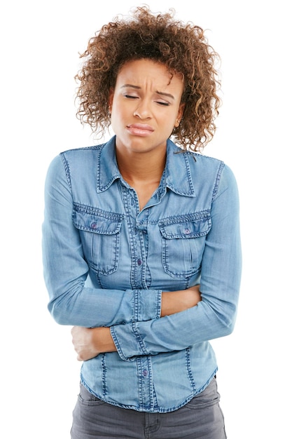 Dont let menstrual cramps get you down Studio shot of a young woman experiencing stomach pain against a white background