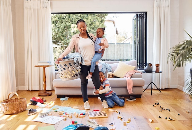 Dont let the pressures of life get to you Shot of a little boy throwing a tantrum while holding his mothers leg at home