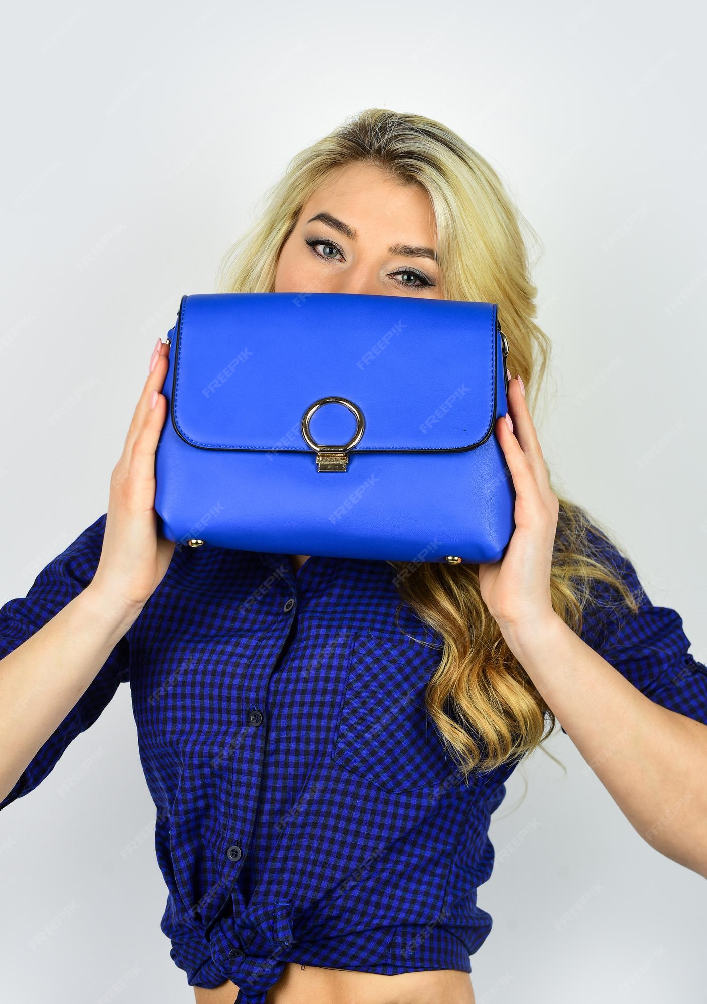 Premium Photo | Dont overlooked detail. blond girl with flight clutch. wear elegant style. model hold leather bag. sexy woman with makeup and long curly hair. businesslady in stylish outfit. shopping and Premium Photo | Dont overlooked detail. blond girl with flight clutch. wear elegant style. model hold leather bag. sexy woman with makeup and long curly hair. businesslady in stylish outfit. shopping and